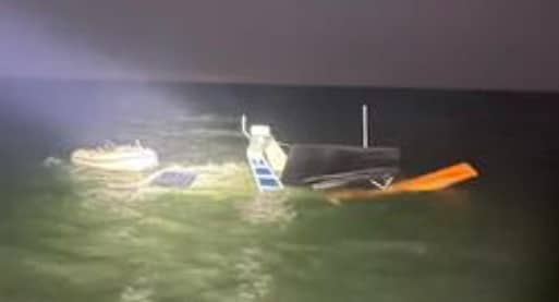 Sinking boat found empty 2 miles off Florida beach before swimmer is spotted, cops say